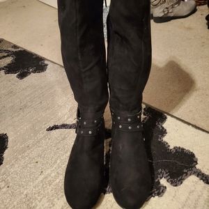 Brand new, never worn, black knee-high boots.